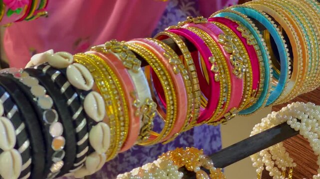 Colorful Traditional Silk Thread Bangles and Shell Wristwear Stand Display