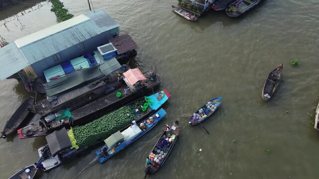 Aerial Wide shot of vendors trading traditional fruit at Cai Rang floating market, Mekong Delta, Can Tho, Vietnam