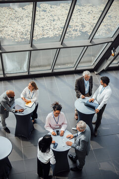 Business people gather for a meet and greet at a trade fair