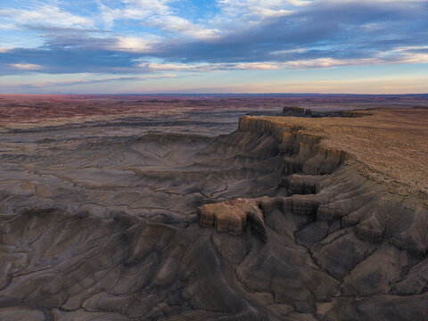 Aerial view of the rugged desert landscape and eroded mesas near Hanksville, Utah, United States.