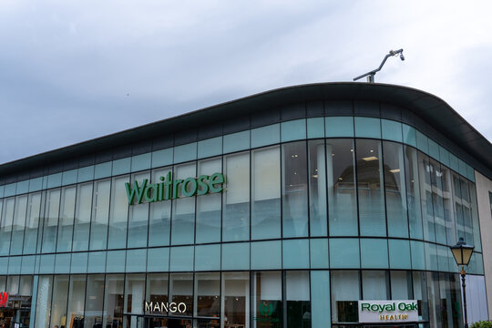 Waitrose grocery store with glass-fronted building in Windsor, Berkshire, England