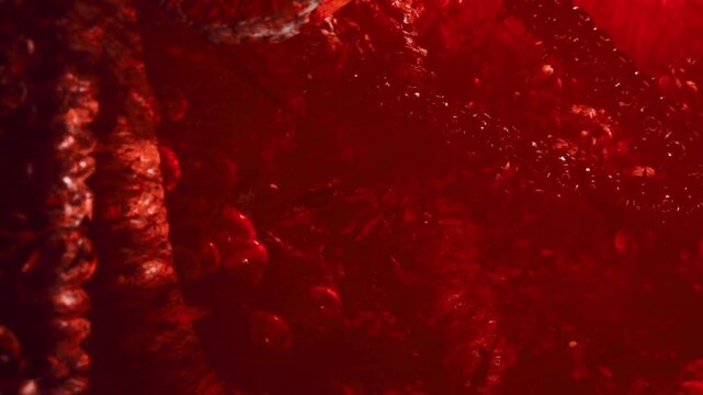 A captivating scene unfolds with deep red tones swirling and dancing, evoking emotions of passion and intensity. The texture and movement create a mesmerizing effect that draws the eye.