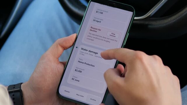 A user reviews home insurance claims on a smartphone, comparing a paid water damage case with a declined burglary report, highlighting digital claims management and policy transparency.
