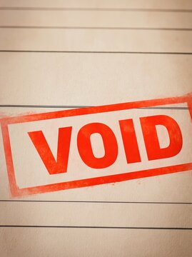 Red void rubber stamp mark on lined paper document