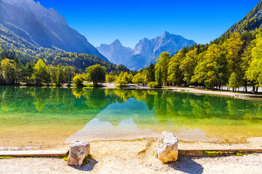 Scenic Jasna lake in Kranjska Gora, Slovenia. Julian Alps in background.
