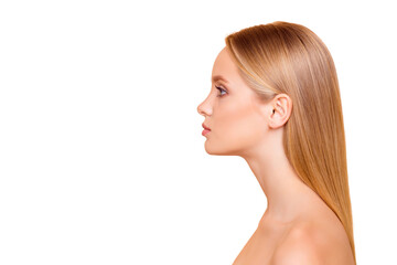 Profile portrait with copy space empty place for advertisement of calm, pretty, dreamy model with perfect smooth soft skin isolated on beige background, wellness wellbeing, rejuvenation concept © deagreez