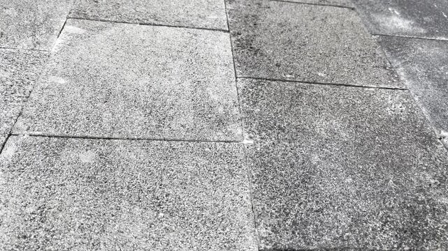 Top down texture of rectangular concrete paving blocks pavement