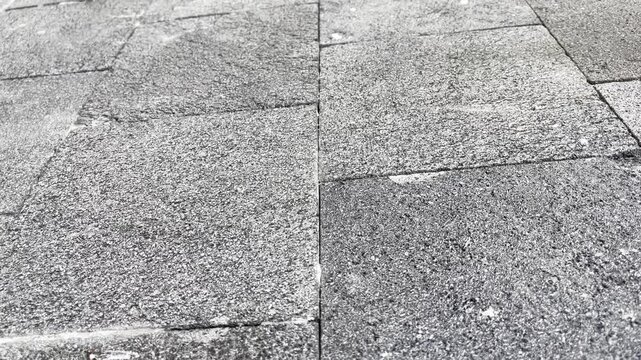 Top view texture of stone paving slabs with rough concrete surface