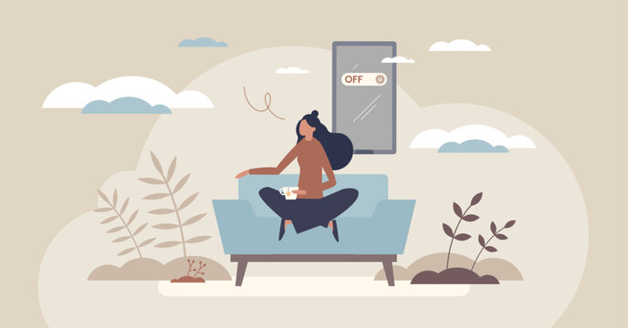 Unplugging tiny downtime, woman on sofa with cup, big phone set to OFF. Concept, digital detox, calm mindfulness at home. Objects, sofa, phone, cup. Tiny style