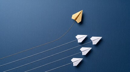 Fototapeta premium Unique Golden Paper Plane Changing Direction From Group of White Ones on Blue Background, Concept of Leadership, Innovation, Individual Success, and Creative Business Strategy Top View Overhead