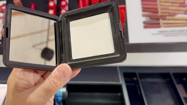 Eyeshadow and Blush Palettes on Display in Cosmetics Store &ndash; Colorful Makeup Products on Shelf