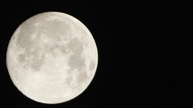 Moon astronomy lunar detailed view of the full moon in the dark night sky for scientific or atmospheric use