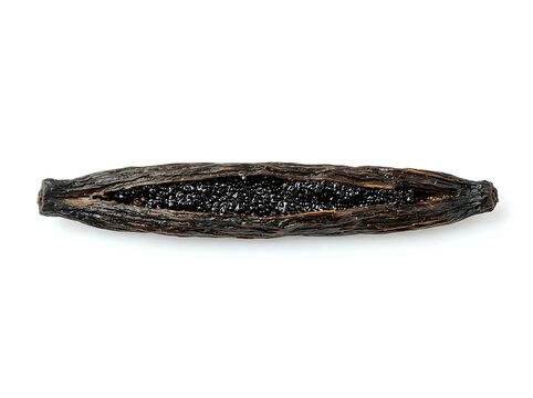 Dried vanilla pod with black seeds visible inside elongated brown husk