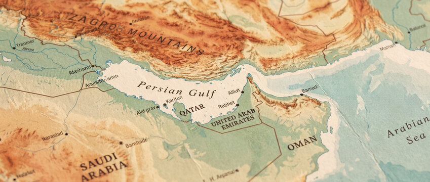 Persian Gulf region on vintage map showing detailed topography of Zagros Mountains, Middle East coastlines, and relief terrain on aged paper texture for travel and history projects