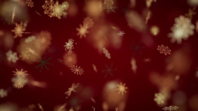 Beautiful golden snowflakes falling on red winter holiday background