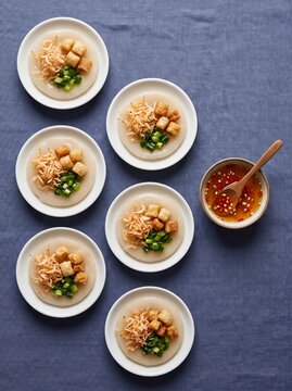Vietnamese banh beo rice cakes with shrimp scallions and crispy topping