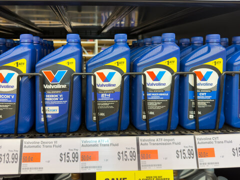 Aubrey, Texas, USA - September 22nd, 2026: Valvoline automatic transmission fluid bottles standing on shelf inside AutoZone store