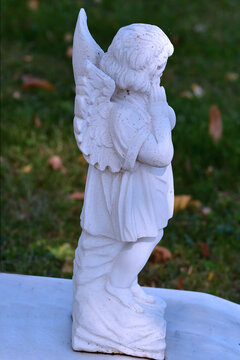 sweet angel figure on a grave