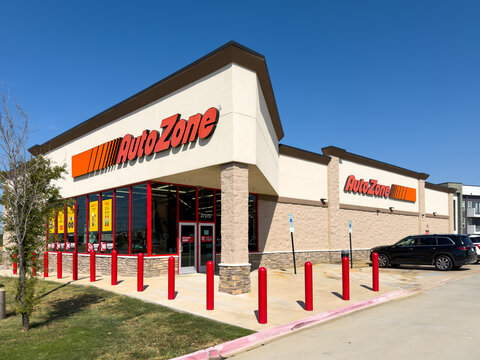 Aubrey, Texas, USA - September 22nd, 2026: Exterior view of AutoZone store building and parking area under blue sky