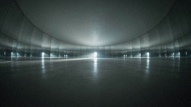 Symmetrical perspective view of a large circular industrial storage warehouse interior with industrial warehouse circular concrete interior structure perspective architecture building