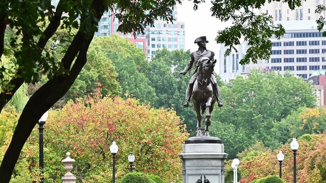 The Boston Public Garden as seen from Commonwealth Avenue on a Cloudy day.