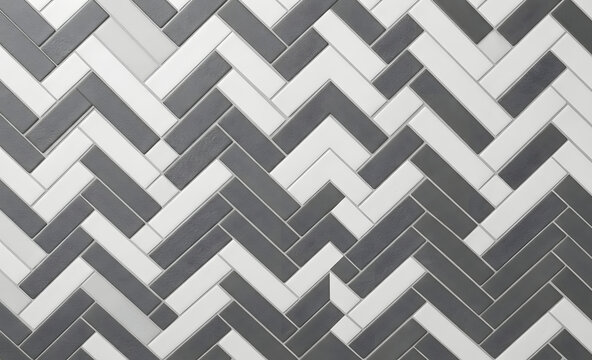 Modern herringbone tile pattern with contrasting white, grey, and dark grey rectangular bricks in a zigzag layout