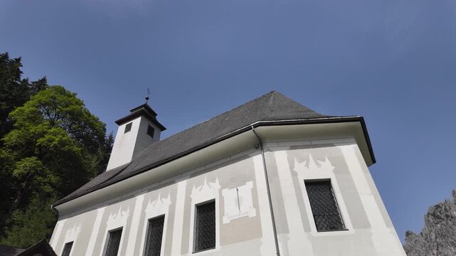 Scenic facade of the historic mountain church in Johnsbach, Styria, Austria
