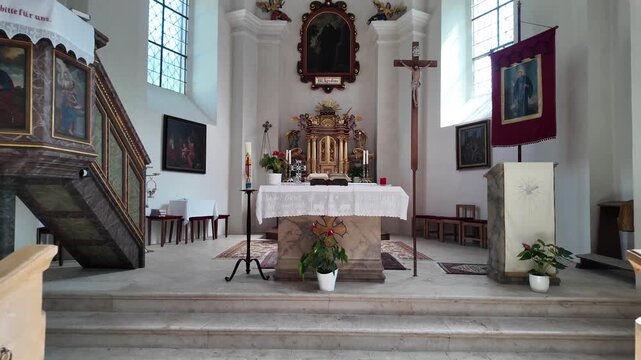 Peaceful view of the ornate church altar in Johnsbach, Austria