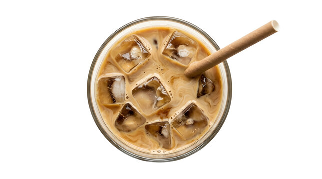 Top down view of a clear glass filled with refreshing iced coffee and swirling cream, featuring seven square ice cubes and a brown paper straw resting diagonally across the top right against pure