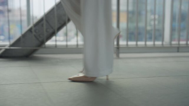 Close Up of Businesswoman Walking Barefoot in Modern Office Building