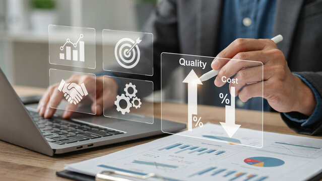 Business analyst reviewing financial data with holographic analytics illustrating growth and cost reduction strategies