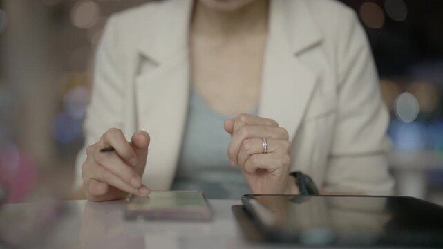 Businesswoman Using Digital Tablet for Online Work in Modern Office