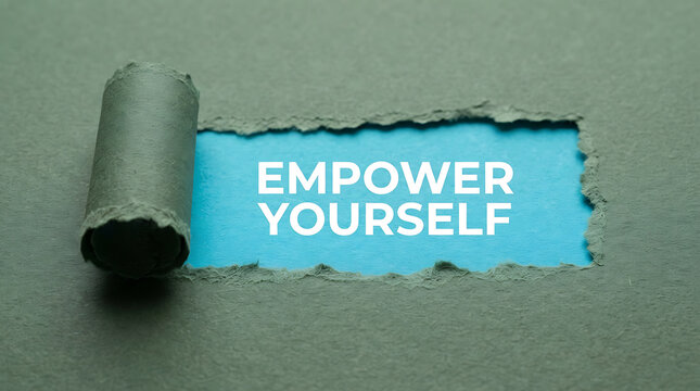 Empower yourself motivational quote on textured wall