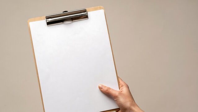 Minimalist wooden clipboard with blank white paper held by hand, professional office stationery mockup, clean document holder for business notes