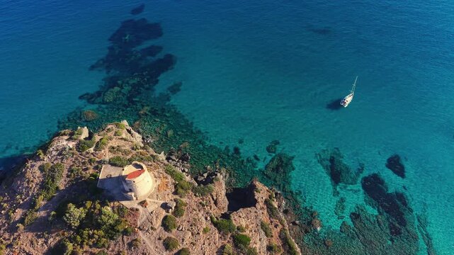 Scenic drone flight over Torre Cannai, Sant'Antioco Island, South Sardinia, Italy, Europe


