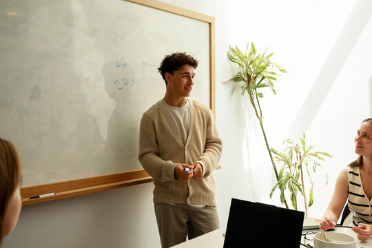 Teacher Explains Math Concepts to Students