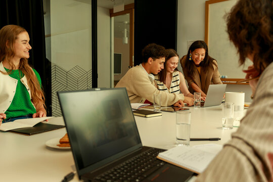 Team Members Collaborate on Project