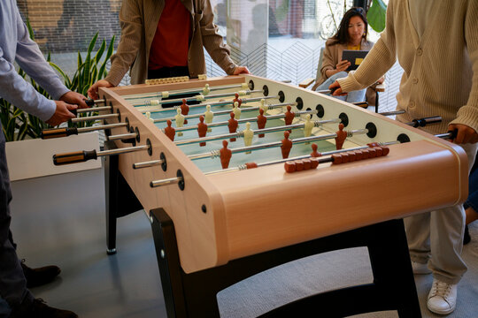 People Playing Table Football
