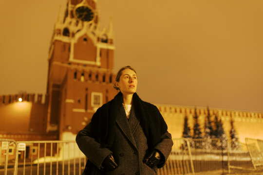 Visiting the Kremlin at Night With a Person in a Coat