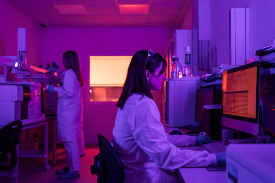 Scientists Working in a Laboratory During Evening Hours