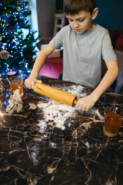 Rolling Dough for Festive Treats During the Holiday Season
