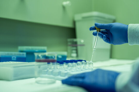 Scientist Conducts Experiment in Laboratory