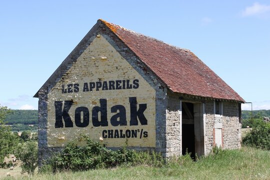 Chagny, France - July 5, 2020: Old Kodak advertising on a wall in Chagny, Burgundy, France