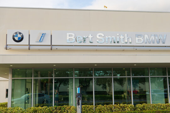 Bert Smith BMW dealership exterior with large branded sign Editorial Use Only October 4,  2026 St. Petersburg, FL ,USA reflective showroom windows and empty parking lot, conveying automotive retail, b