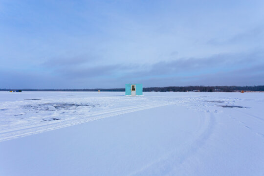 Ice Fishing Shack on Frozen Lake