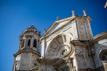 View of the beautiful baroque facade of the Cathedral of Cadiz, Andalusia, with day lighting © AntonioLopez