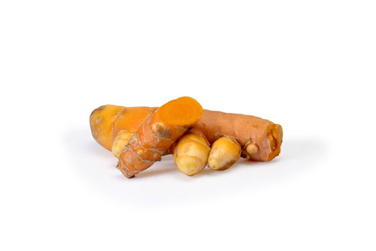 Organic turmeric whole and sliced isolated white