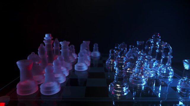 Horizontal camera tracking shot of a modern glass chess set showcasing strategy and planning concepts.