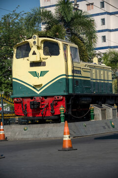 Yogyakarta, Indonesia - August 30, 2026: Vintage D301 62 diesel-hydraulic locomotive preserved as a monument outside historic Yogyakarta Tugu Station.
