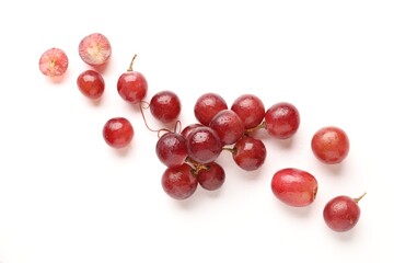 Fototapeta premium Fresh ripe grapes on white background, flat lay